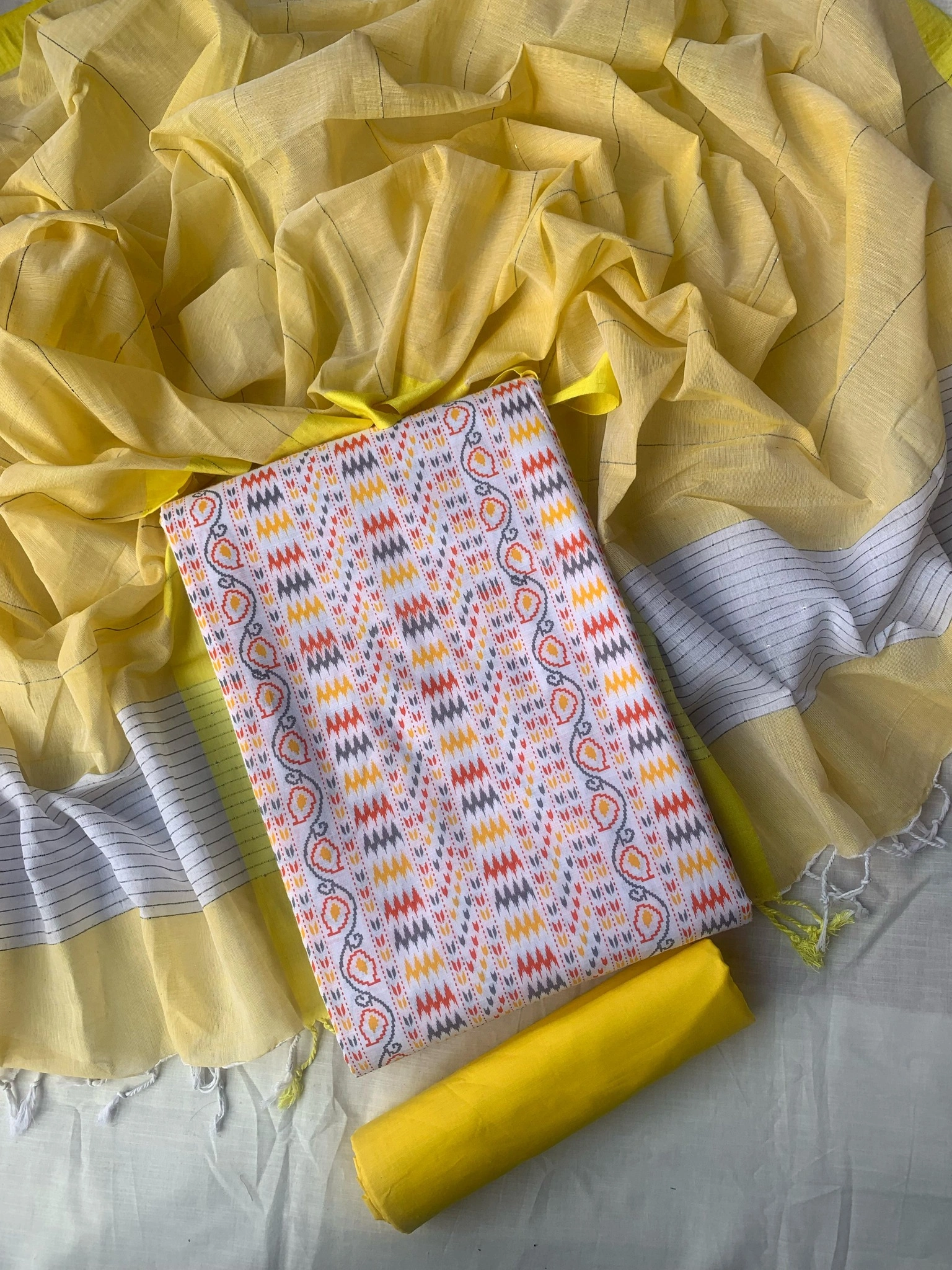 Unstitched Slub cotton three-piece.